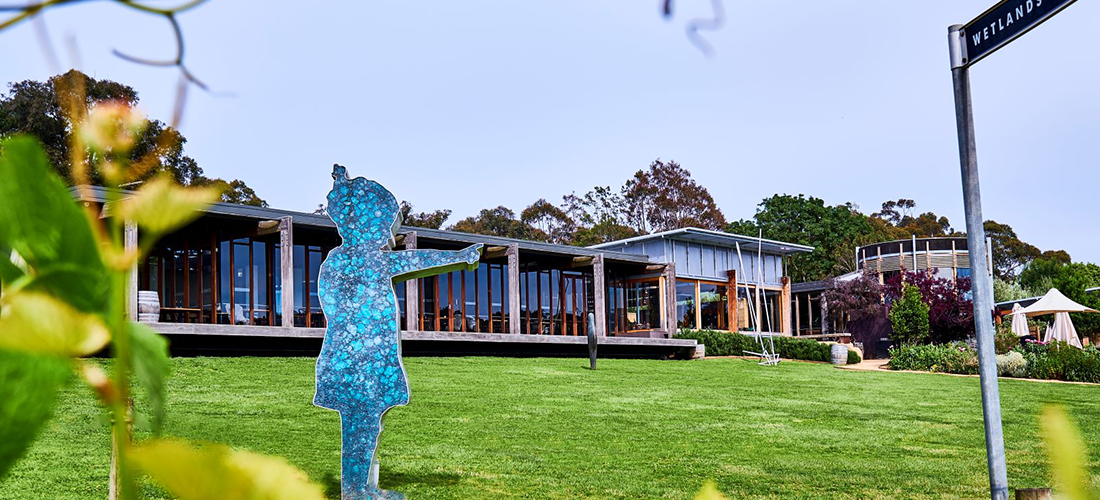 Montalto cellar door, girl pointing to the vineyard